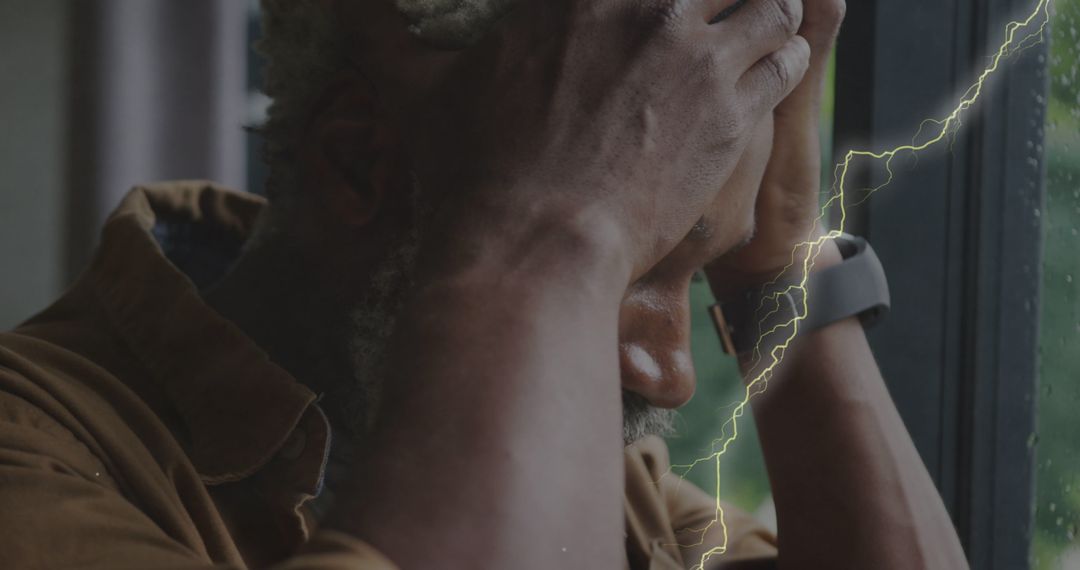 Senior Man Stressed as Lightning Strikes, Mental Health Concept