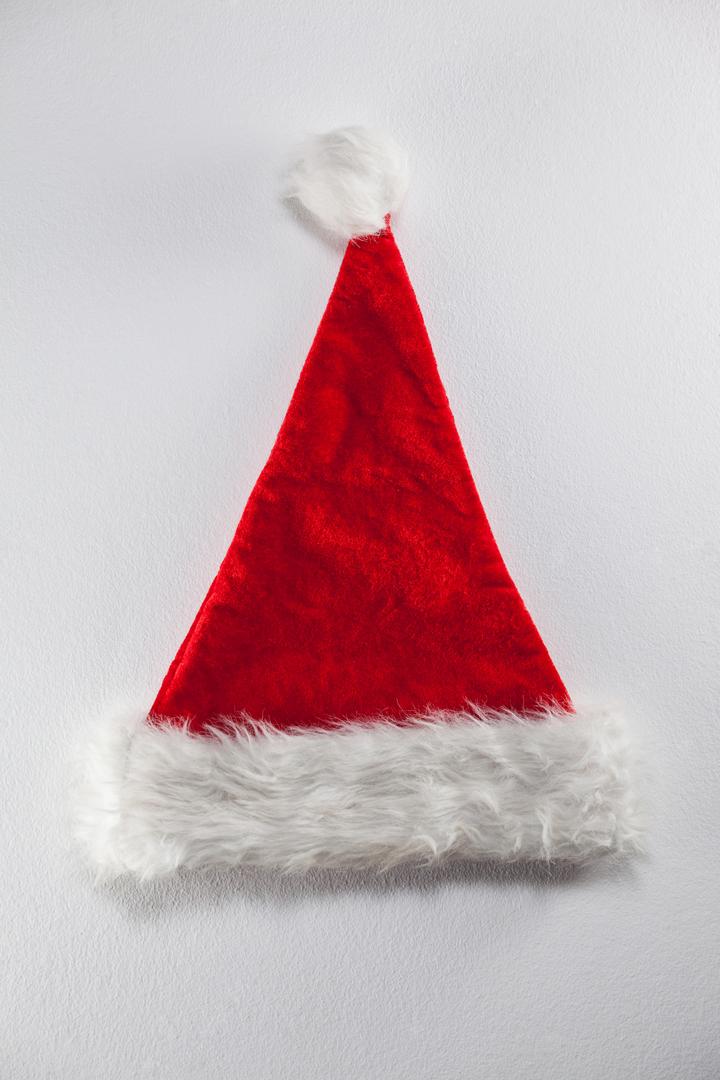 Santa hat on white background - Free Images, Stock Photos and Pictures on Pikwizard.com