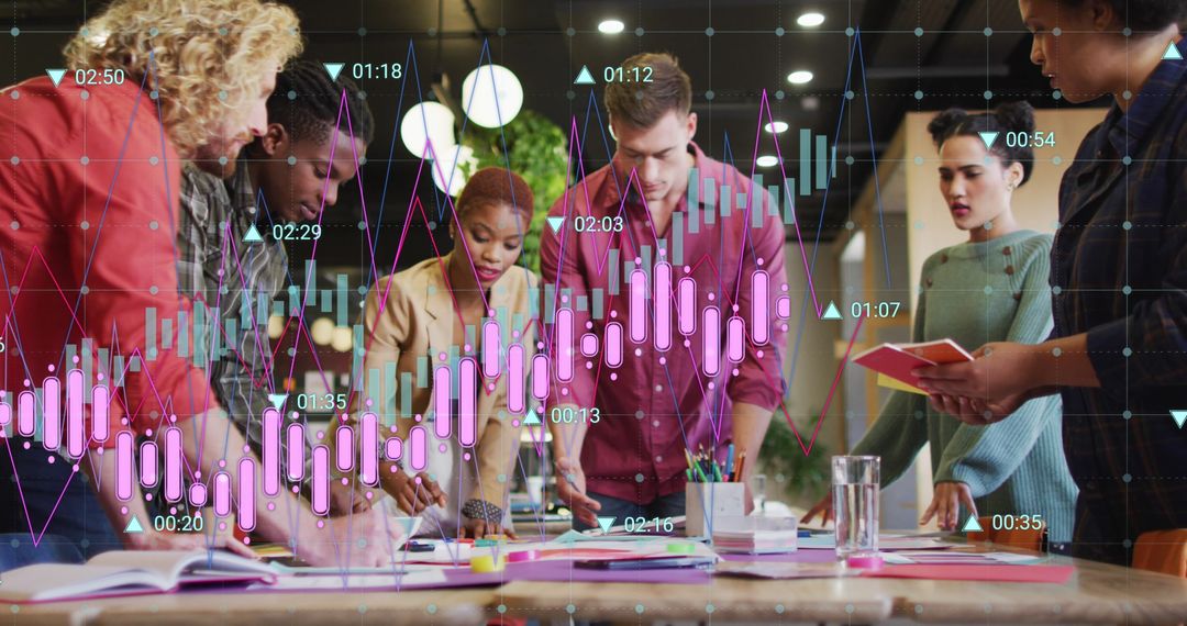 Innovative Team Analyzing Business Growth with Digital Graphs