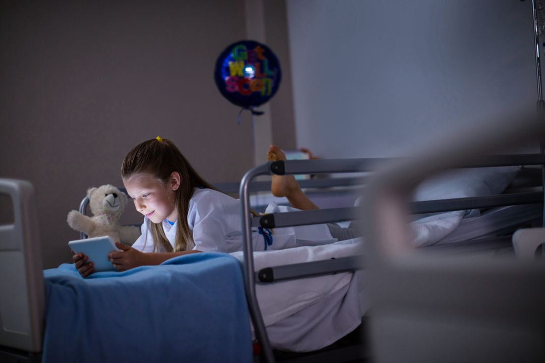 Patient using digital tablet in ward - Free Images, Stock Photos and Pictures on Pikwizard.com