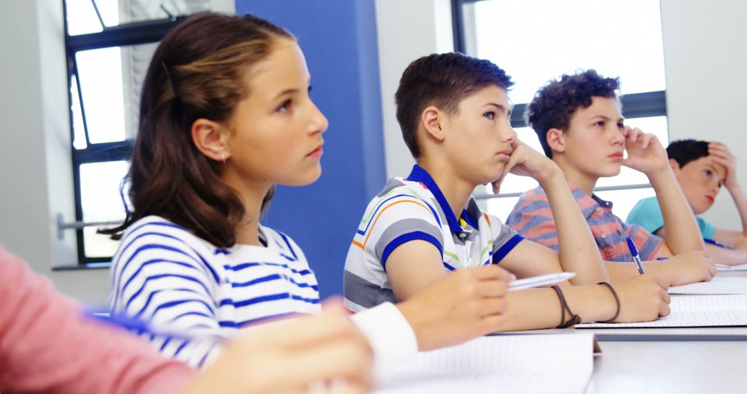 Engaged Students Listening in Classroom Lecture - Free Images, Stock Photos and Pictures on Pikwizard.com