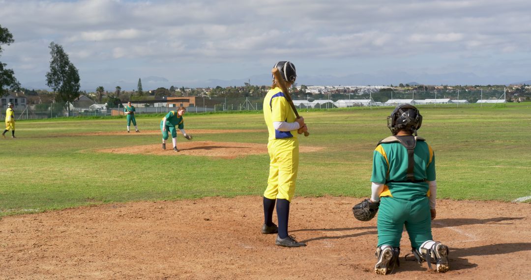 Dynamic Female Softball Game Action with Players Competing Outdoors