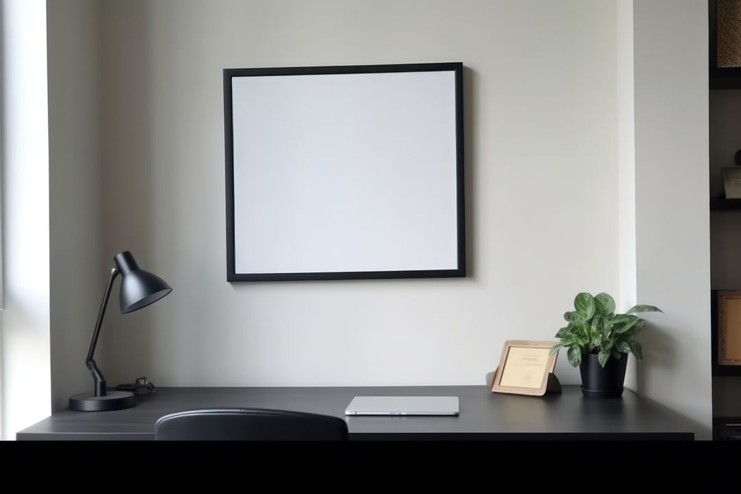 Minimalistic Home Office Desk with Black Lamp and Indoor Plant - Free Images, Stock Photos and Pictures on Pikwizard.com