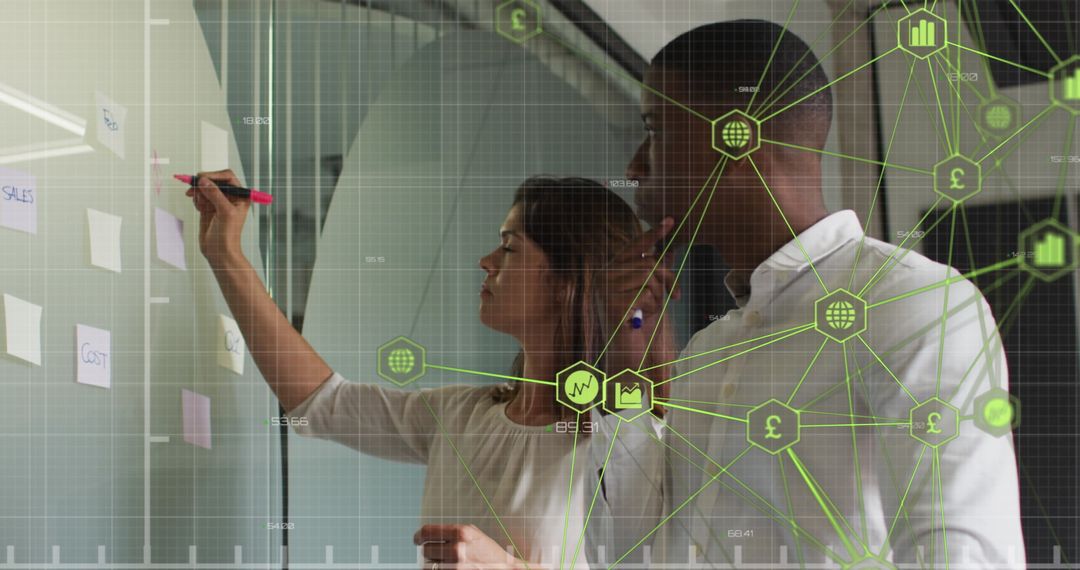 Colleagues Analyzing Data Network Interface in Modern Office