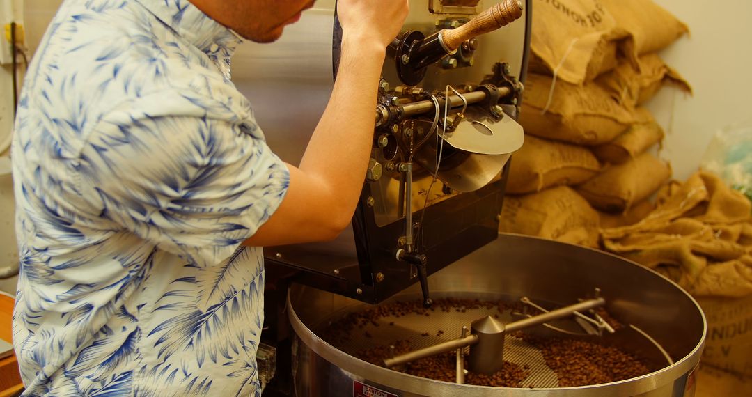 Barista Operating Coffee Grinder in Rustic Café - Free Images, Stock Photos and Pictures on Pikwizard.com