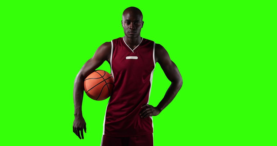 Confident African American Basketball Player Posing with Ball