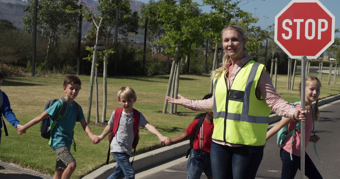 Crossing Guard Helping Children Cross Street Safely - Free Images, Stock Photos and Pictures on Pikwizard.com