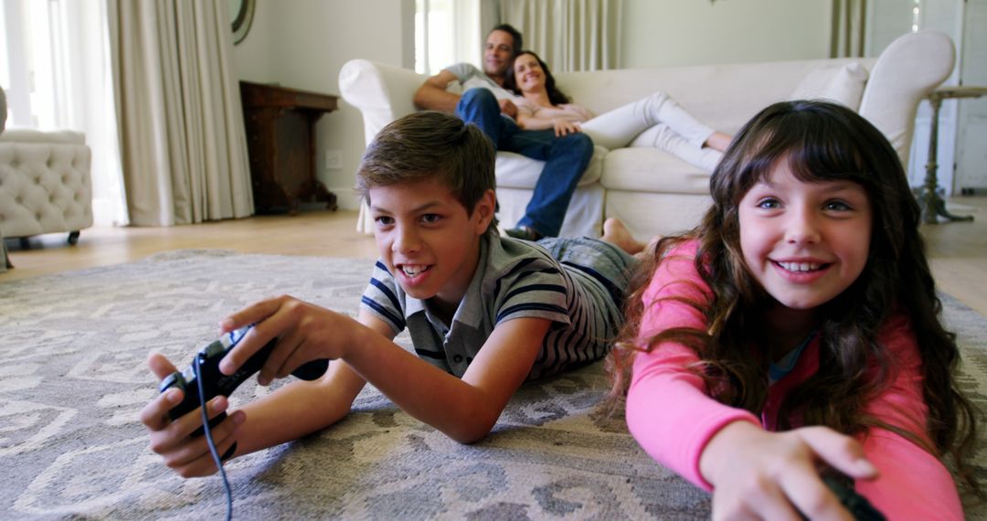 Happy Family with Kids Playing Video Games in Living Room - Free Images, Stock Photos and Pictures on Pikwizard.com