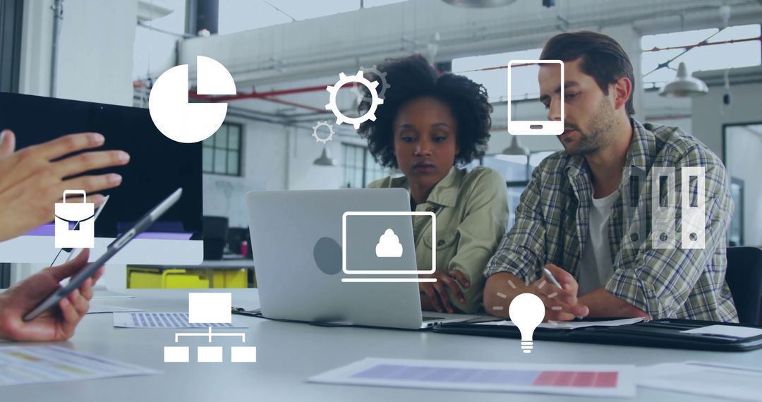 Professionals Collaborating with Digital Technology in Open Workspace