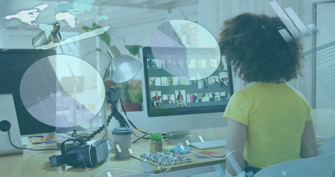 Businesswoman Analyzing Financial Data Using Computer in Office