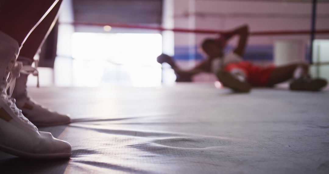 Boxer in the Ring After Defeat with Unfocused Background - Free Images, Stock Photos and Pictures on Pikwizard.com