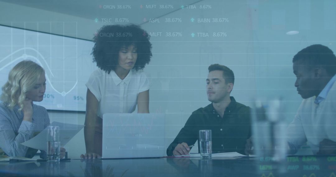 Diverse Team Analyzing Data in Tech-Driven Meeting Room