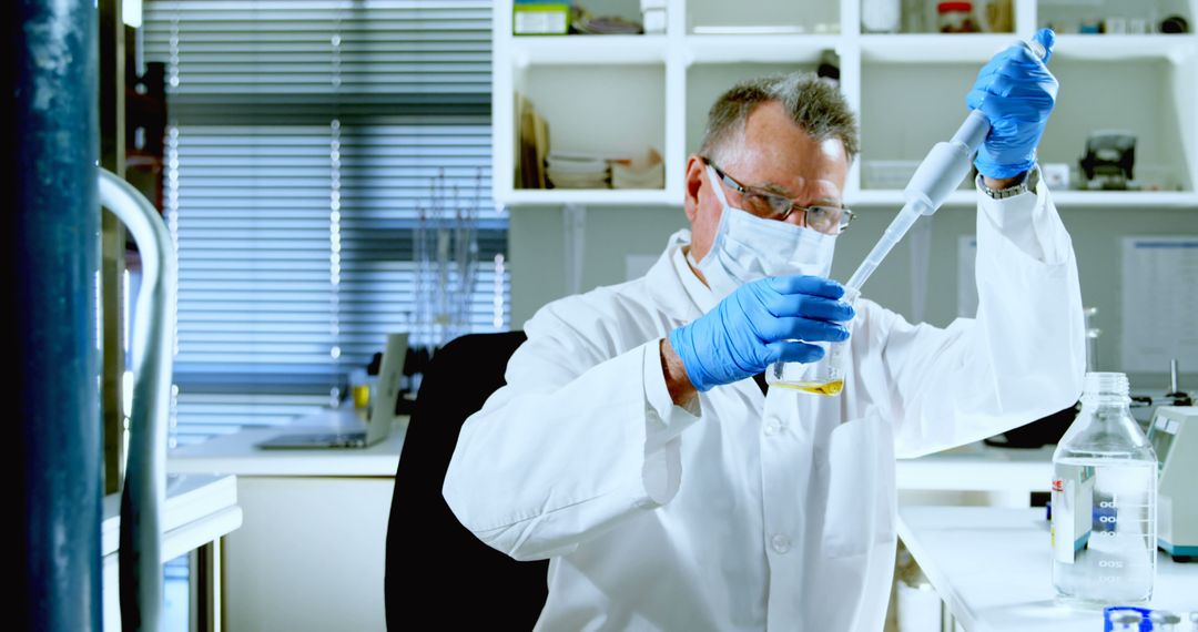 Senior Scientist Conducting Laboratory Experiments - Free Images, Stock Photos and Pictures on Pikwizard.com