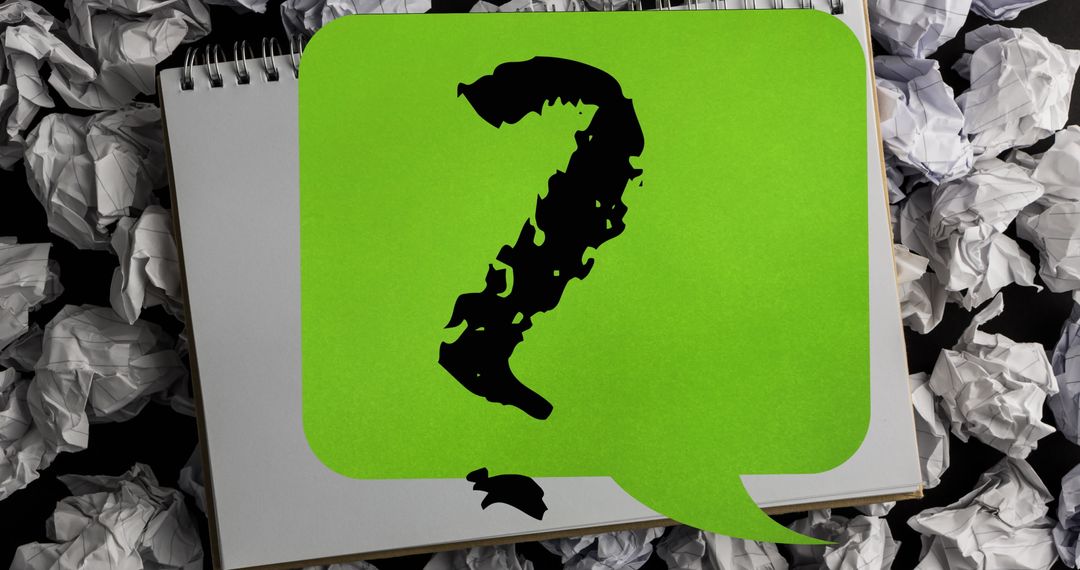 Question Mark Over Notebook Symbolizing Uncertainty in Education