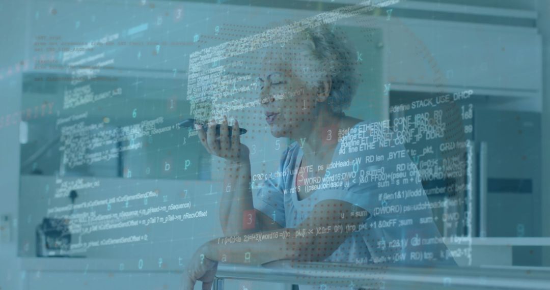Senior Woman Using Speakerphone with Computer Code Overlay