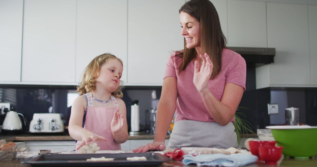 Mother and Child Baking Together in Kitchen, Bonding Moments - Free Images, Stock Photos and Pictures on Pikwizard.com