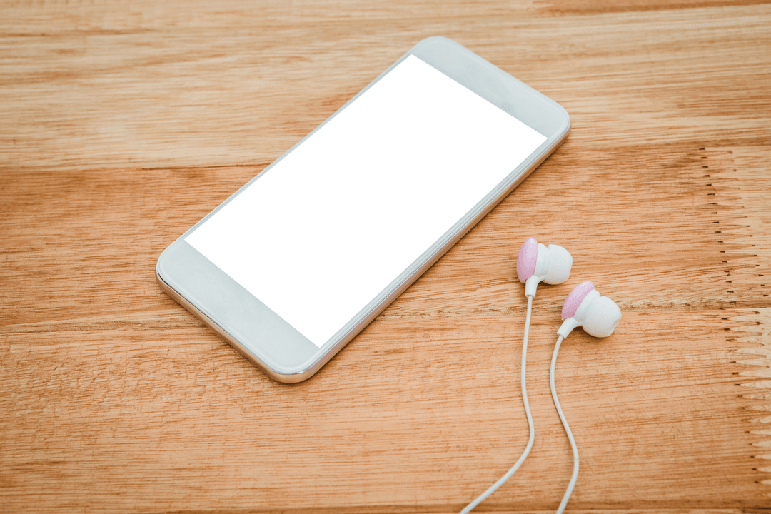 Transparent Smartphone with Headphones on Wooden Surface