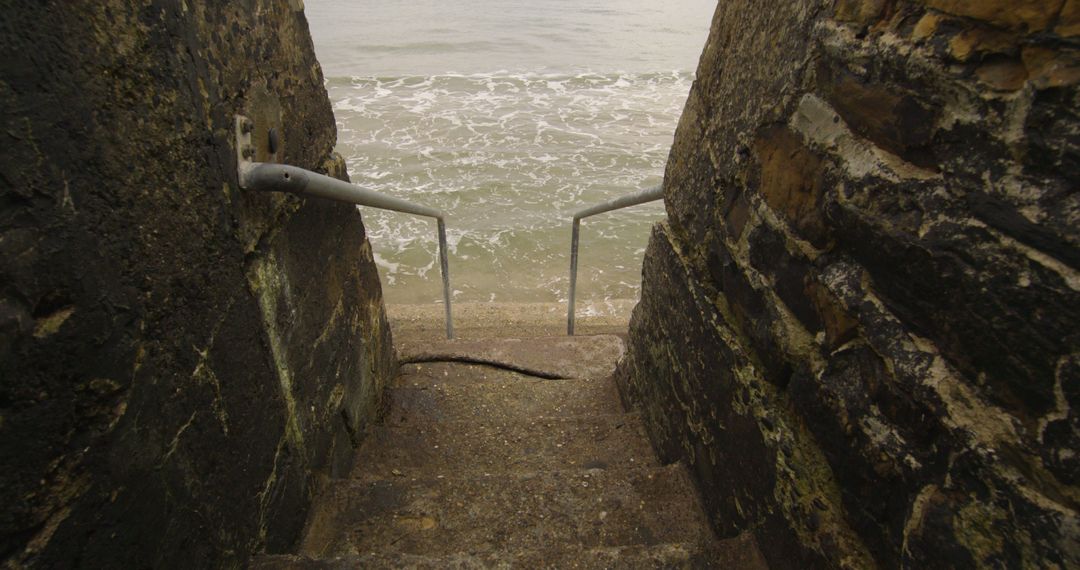 Stone Steps Leading to Tranquil Beach Shore - Free Images, Stock Photos and Pictures on Pikwizard.com