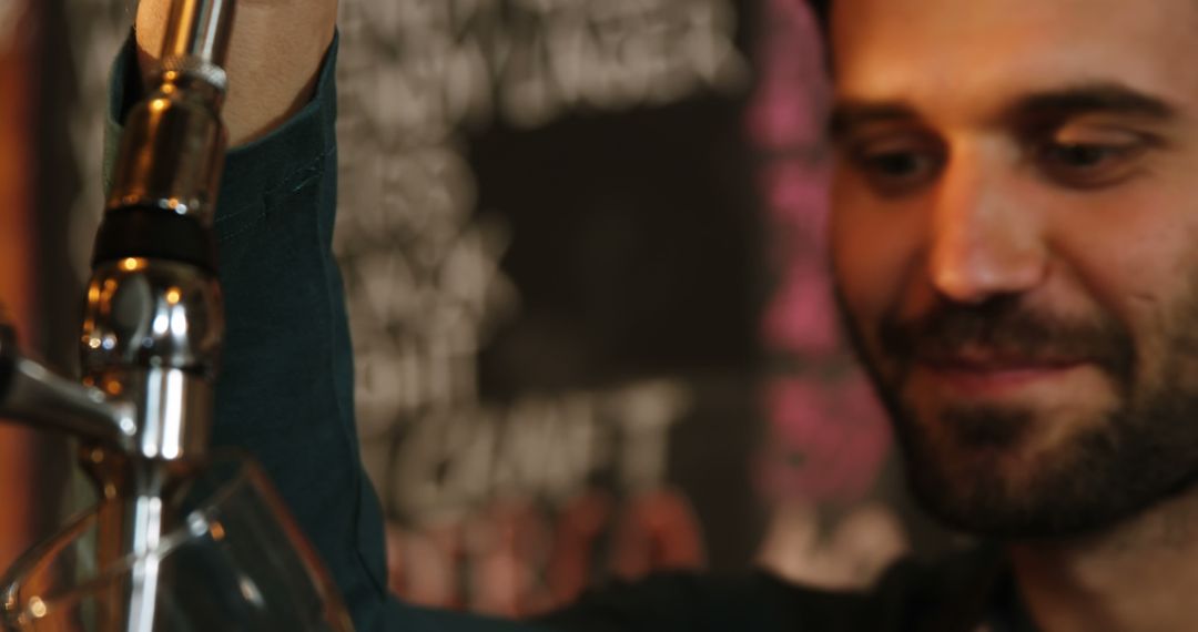 Happy Bartender Pouring Draft Beer for Customer