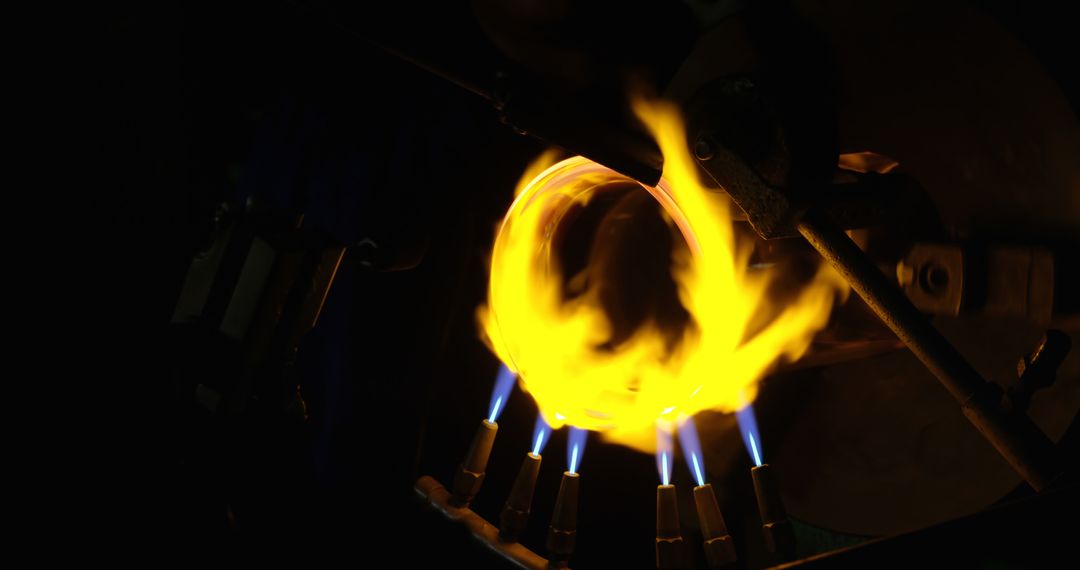 Close-Up of Glassmaking Process with Vivid Flames - Free Images, Stock Photos and Pictures on Pikwizard.com