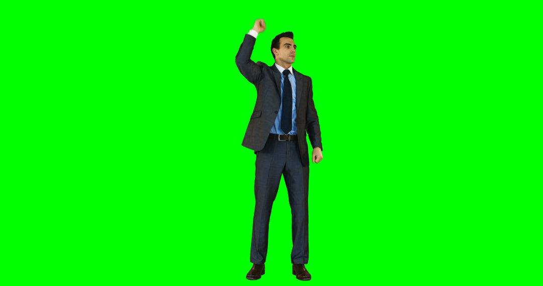 Confident Businessman Raising Hand on Green Screen Background - Free Images, Stock Photos and Pictures on Pikwizard.com