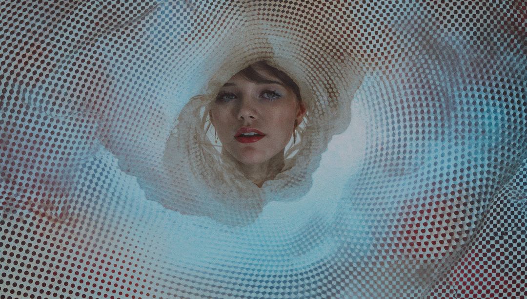 Woman Peering Through Tubular Mesh with Abstract Textured Background