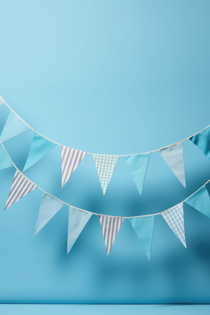 Blue and White Pennant Banner Garland on Light Blue Background - Free Images, Stock Photos and Pictures on Pikwizard.com