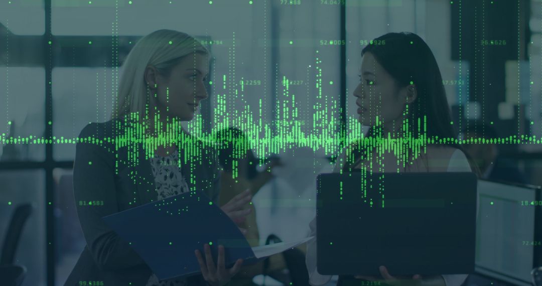 Coworkers Analyzing Digital Data in Modern Office Environment