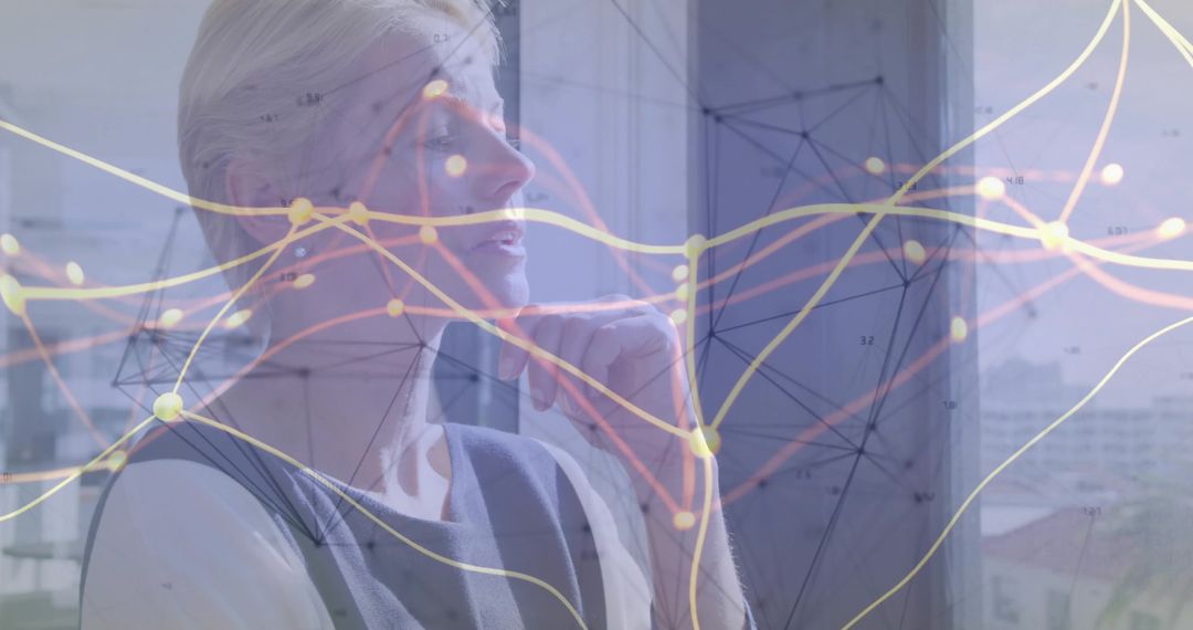 Senior Executive Contemplating Strategic Data Analysis by Window