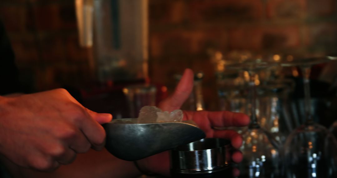 Bartender Preparing Cocktails with Ice in Chic Bar Environment