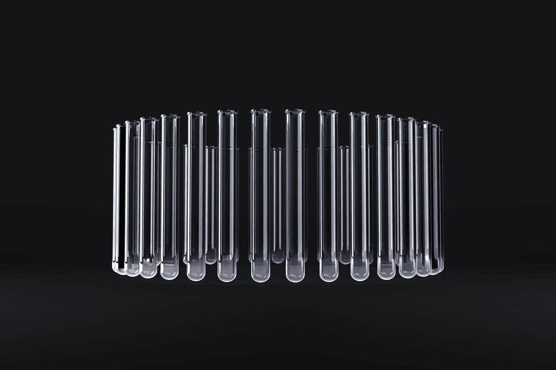 Transparent Test Tubes in Formation on Dark Background