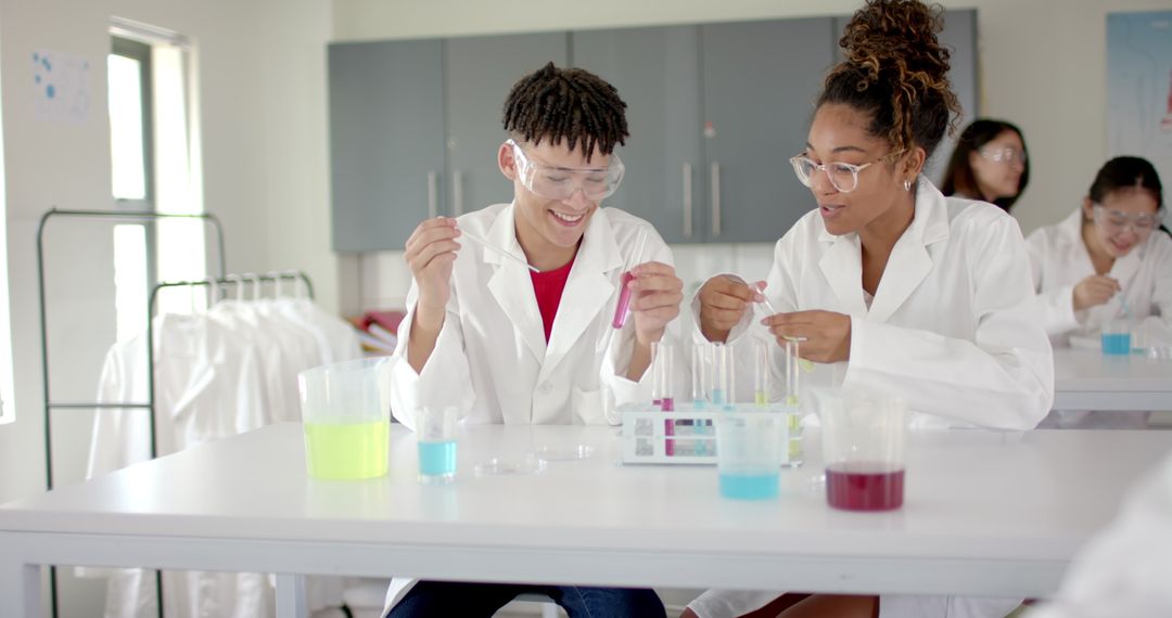 High School Students Engaged in Science Experiment in Laboratory