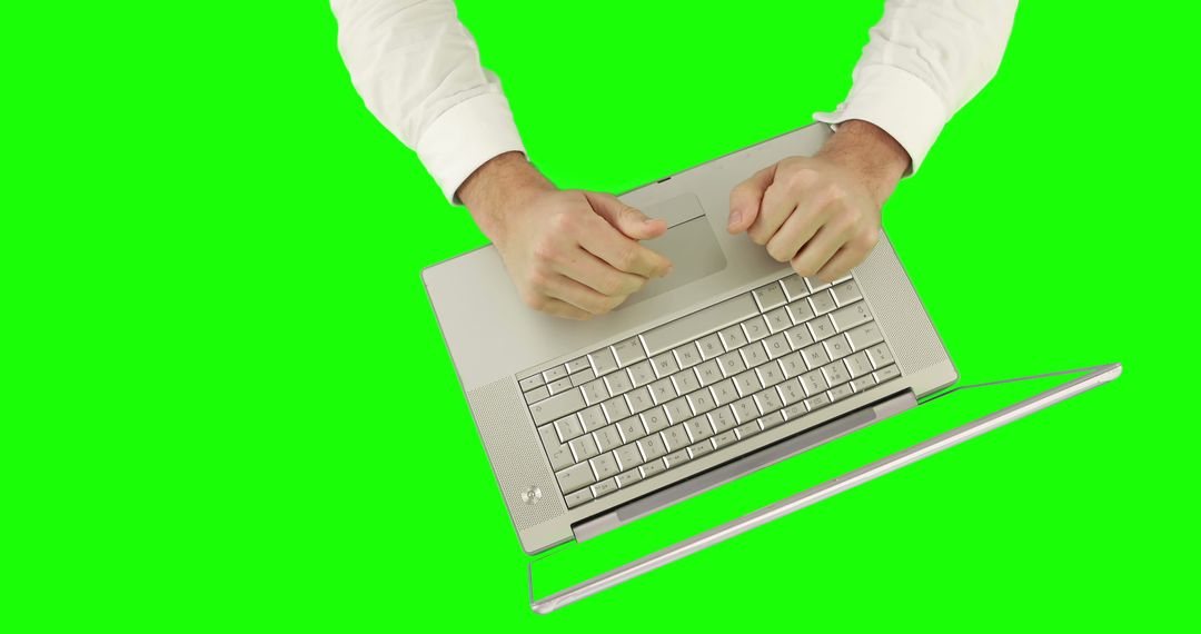 Person Frustrated Using Laptop on Green Background - Free Images, Stock Photos and Pictures on Pikwizard.com