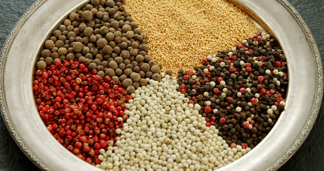 Assorted Whole Spices on Elegant Silver Platter