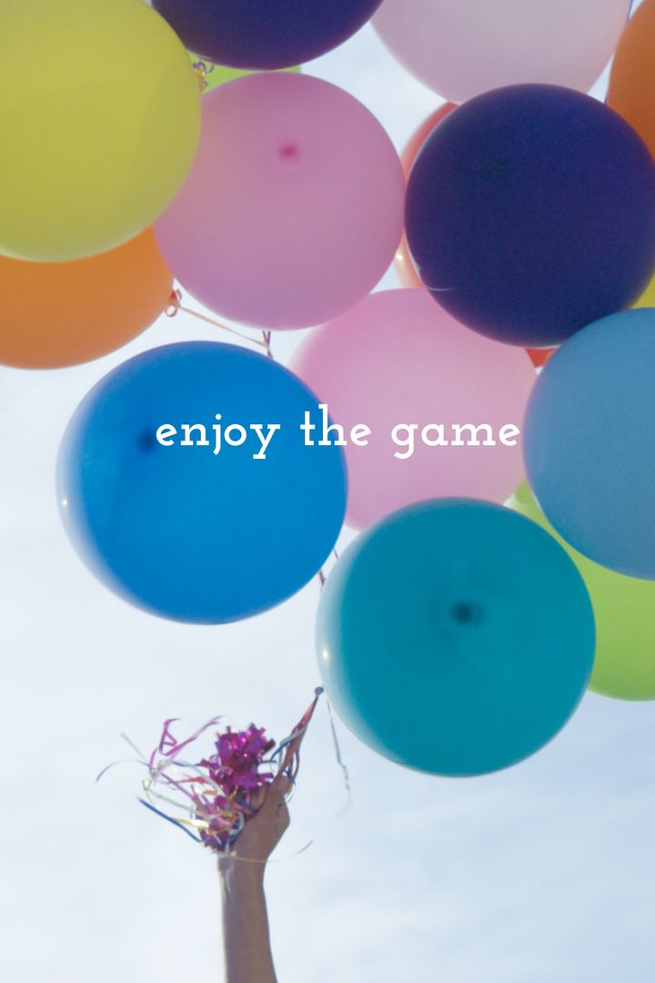 Joyful Cluster of Colorful Balloons Reaching Blue Sky