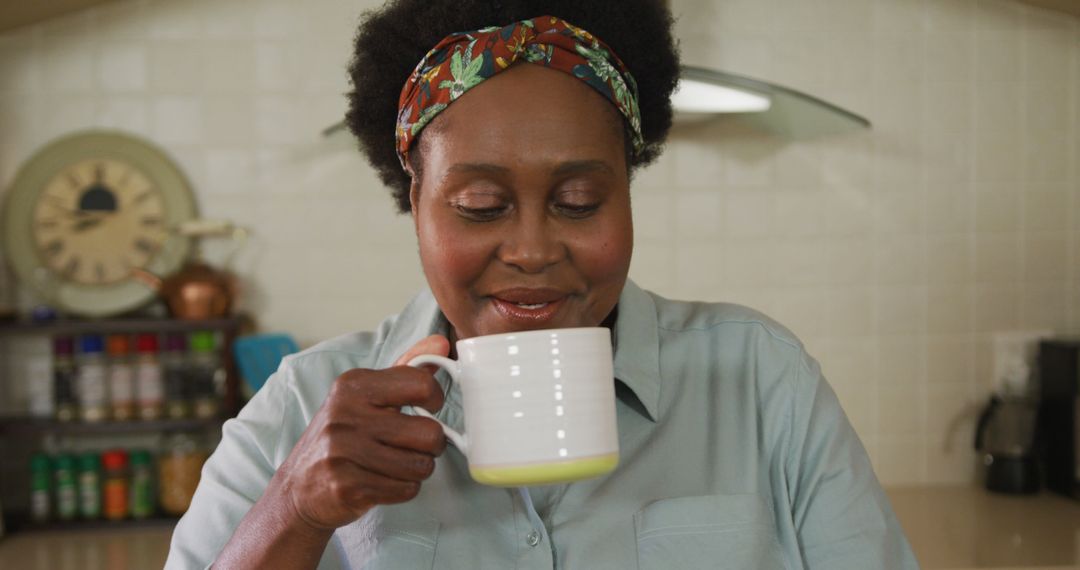 Senior Woman Enjoying Smelling Coffee in Cozy Kitchen - Free Images, Stock Photos and Pictures on Pikwizard.com