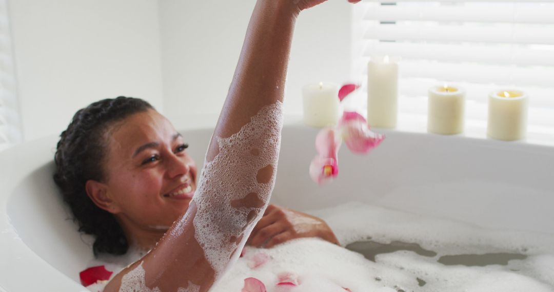 Woman Relaxing in Bubble Bath with Petal Moments - Free Images, Stock Photos and Pictures on Pikwizard.com