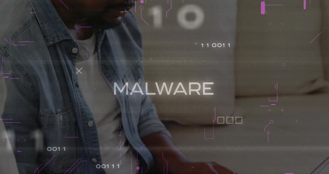 Man Typing Laptop Analyzing Malware Binary Code