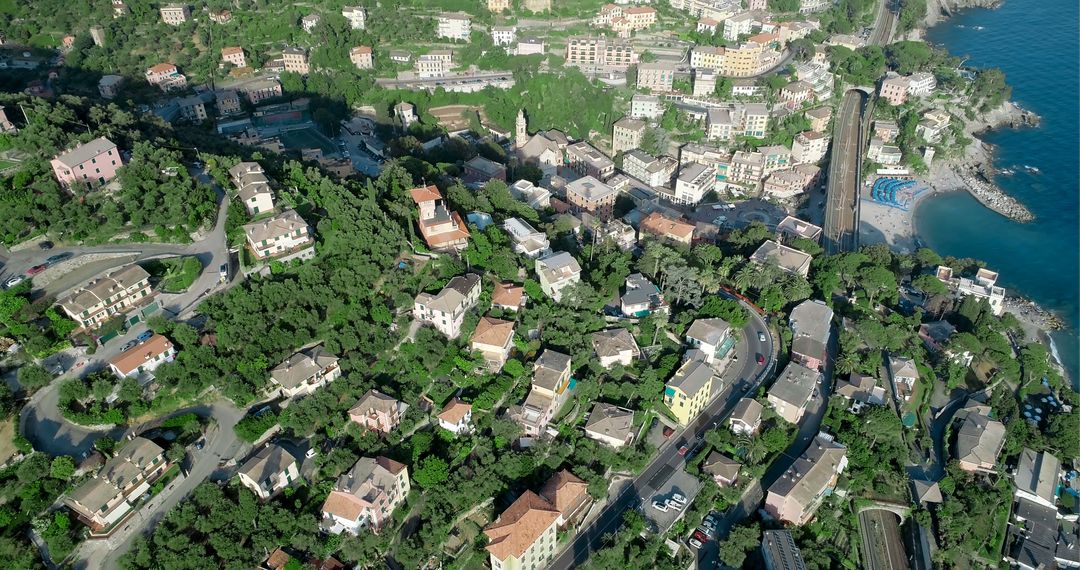 Aerial View of Coastal Town in Italy with Lush Greenery - Free Images, Stock Photos and Pictures on Pikwizard.com