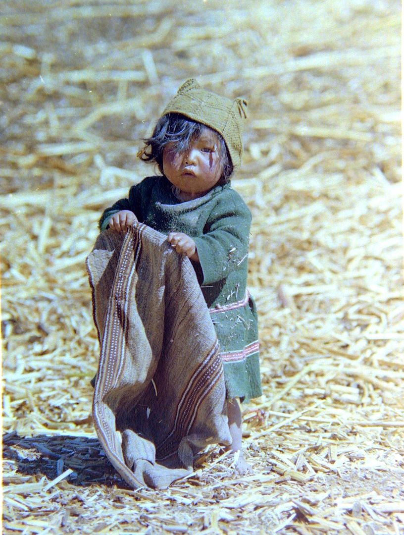 Indigenous Child Holding Woolen Blanket Outdoors - Free Images, Stock Photos and Pictures on Pikwizard.com