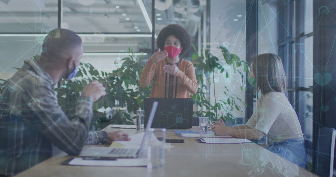 Team Collaborating on Innovative Business Solutions Using Technology