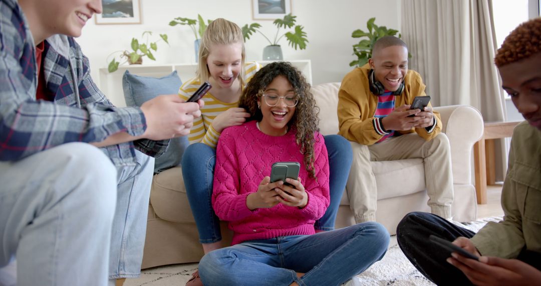 Diverse Group of Friends Hanging Out and Laughing with Smartphones - Free Images, Stock Photos and Pictures on Pikwizard.com