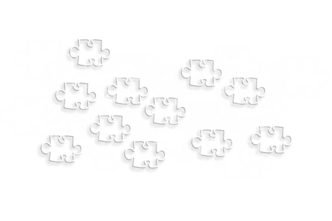Scattered White Puzzle Pieces on Transparent Background