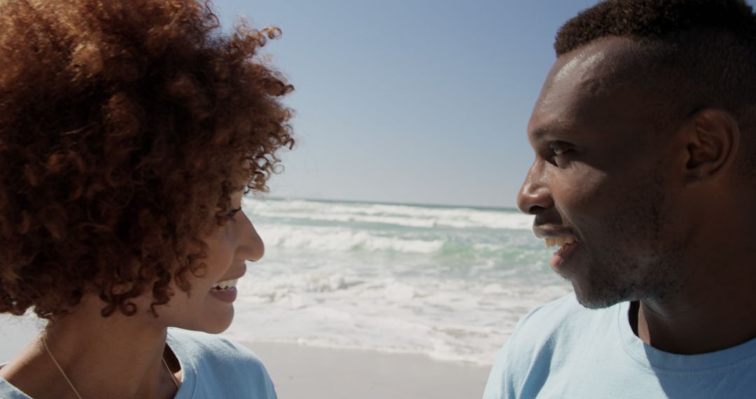 Happy African American Couple Enjoying Beach Day - Free Images, Stock Photos and Pictures on Pikwizard.com