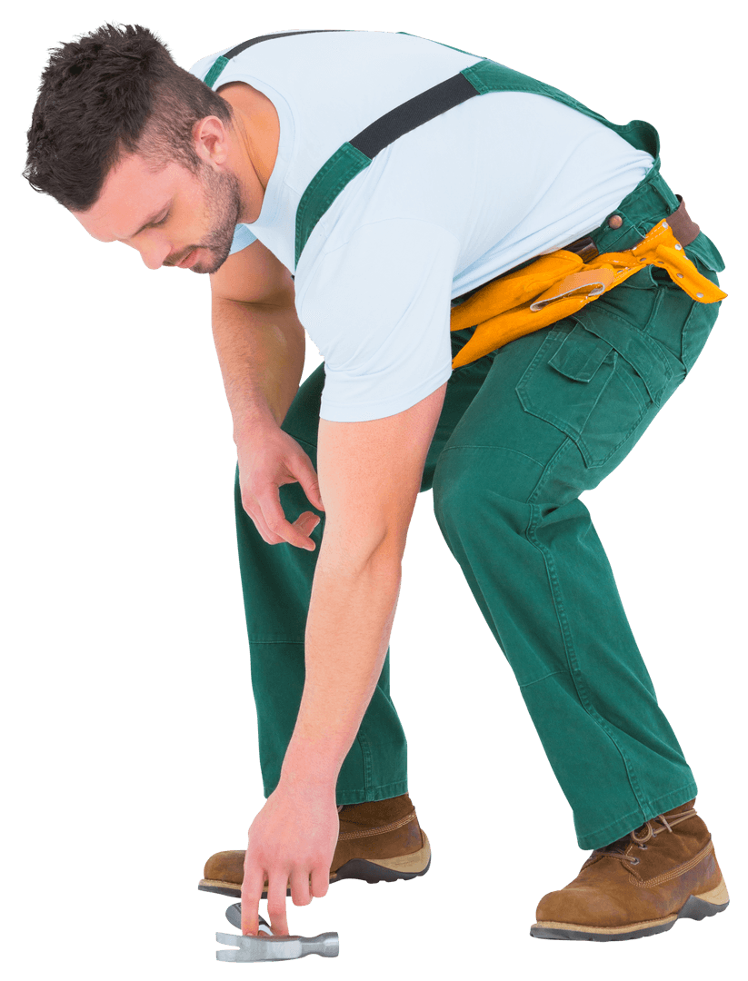 Transparent Carpenter in Green Overalls Picking Up Hammer