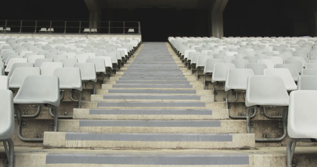 Empty Tiered Stadium Seats and Concrete Steps