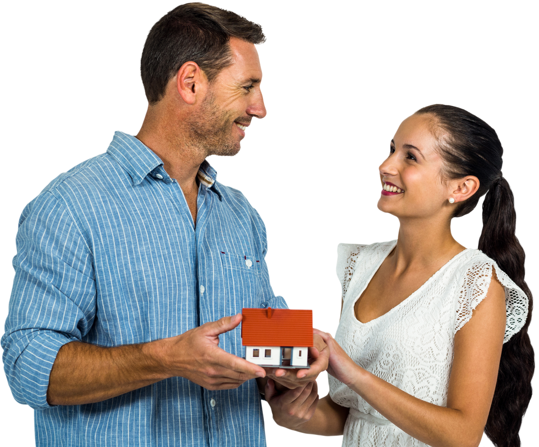 Smiling Couple Holding House Model Isolated on Transparent Background - Download Free Stock Images Pikwizard.com