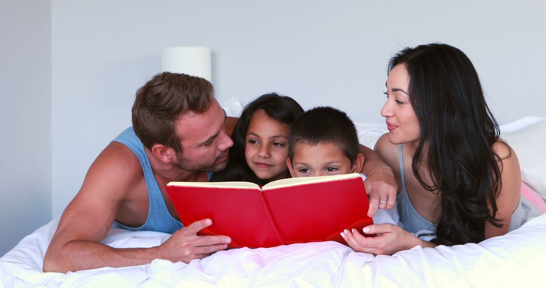 Family Reading Storybook Together in Bed - Free Images, Stock Photos and Pictures on Pikwizard.com