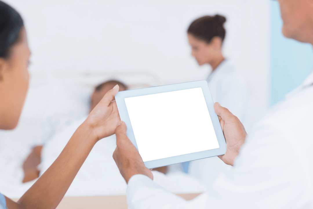 Healthcare Professionals Utilizing Transparent Digital Tablet with Blurred Background