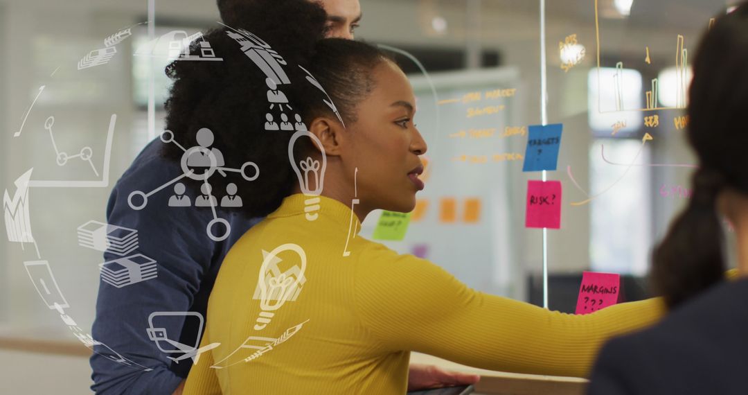 Diverse Business Team Analyzing Financial Data on Digital Interface